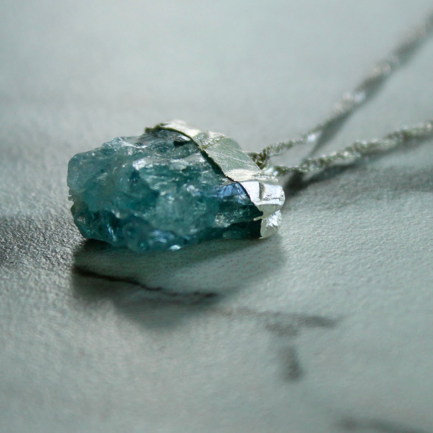 Raw aquamarine pendant