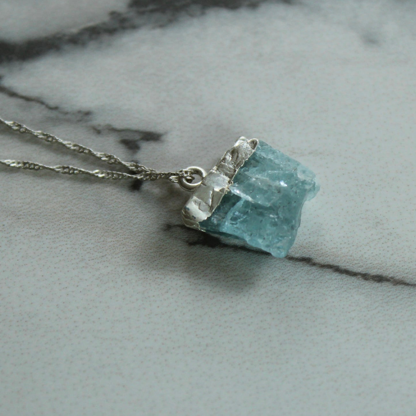Raw aquamarine pendant Louella Jewellery