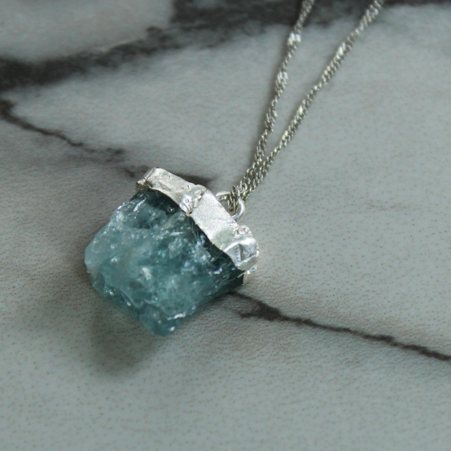 Raw aquamarine pendant Louella Jewellery