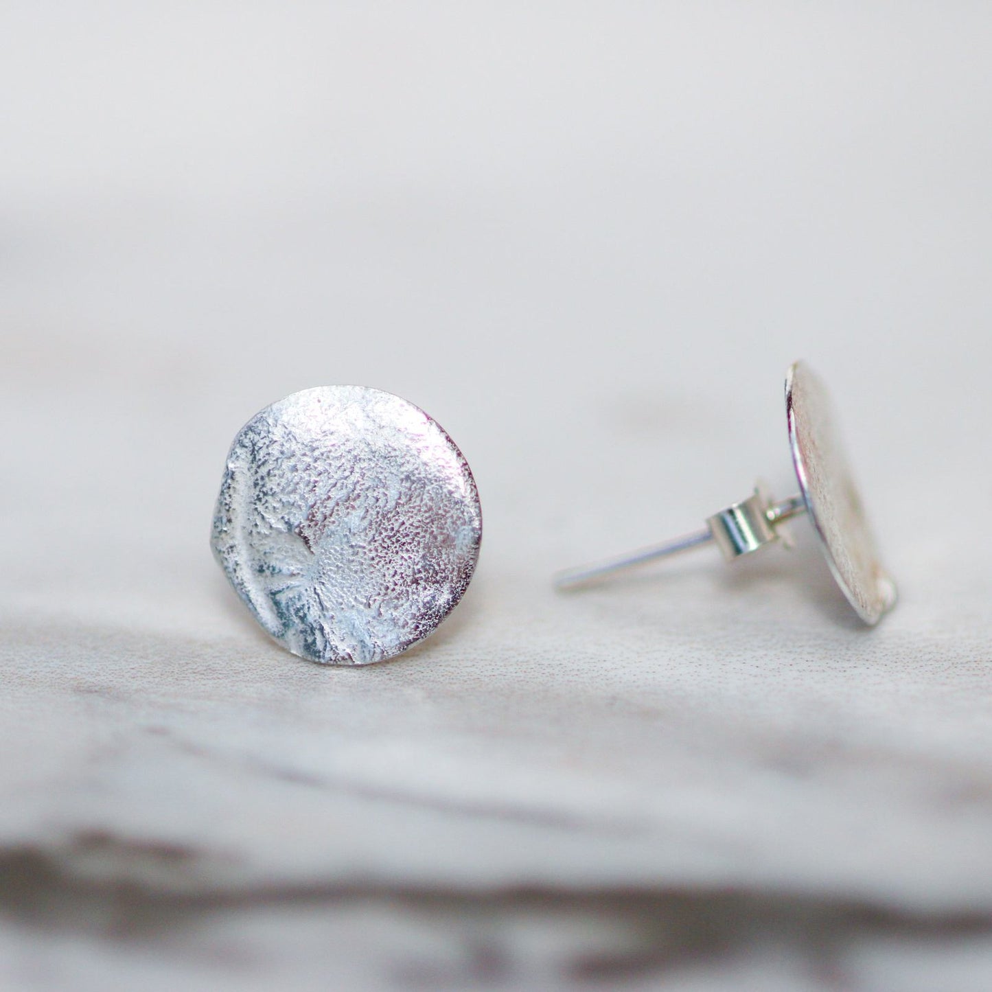 Textured eco silver stud earrings louella-jewellery