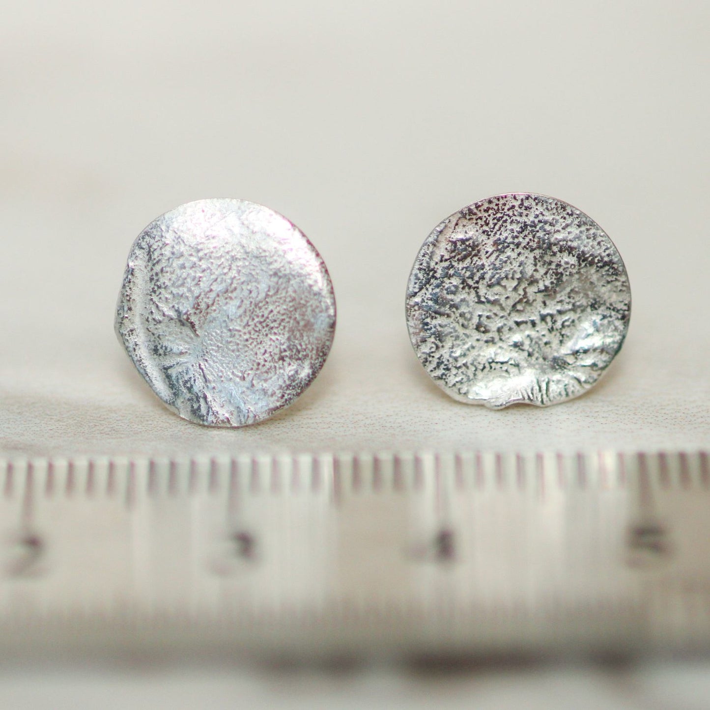 Textured eco silver stud earrings louella-jewellery