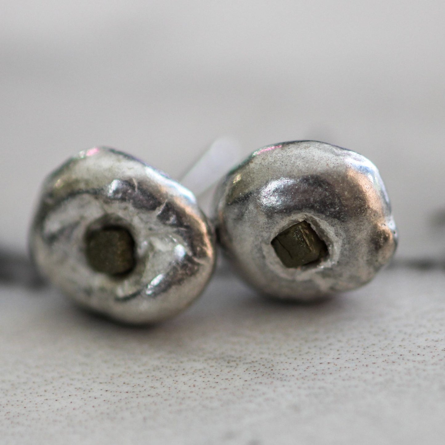 Molten silver stud earrings with raw diamonds louella-jewellery