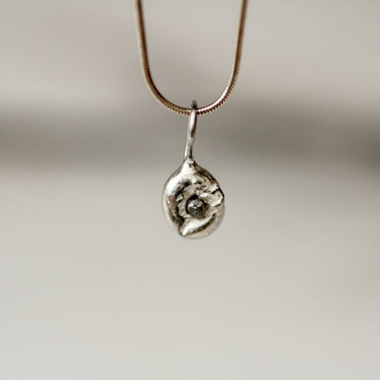 Molten silver, raw diamond pendant louella-jewellery