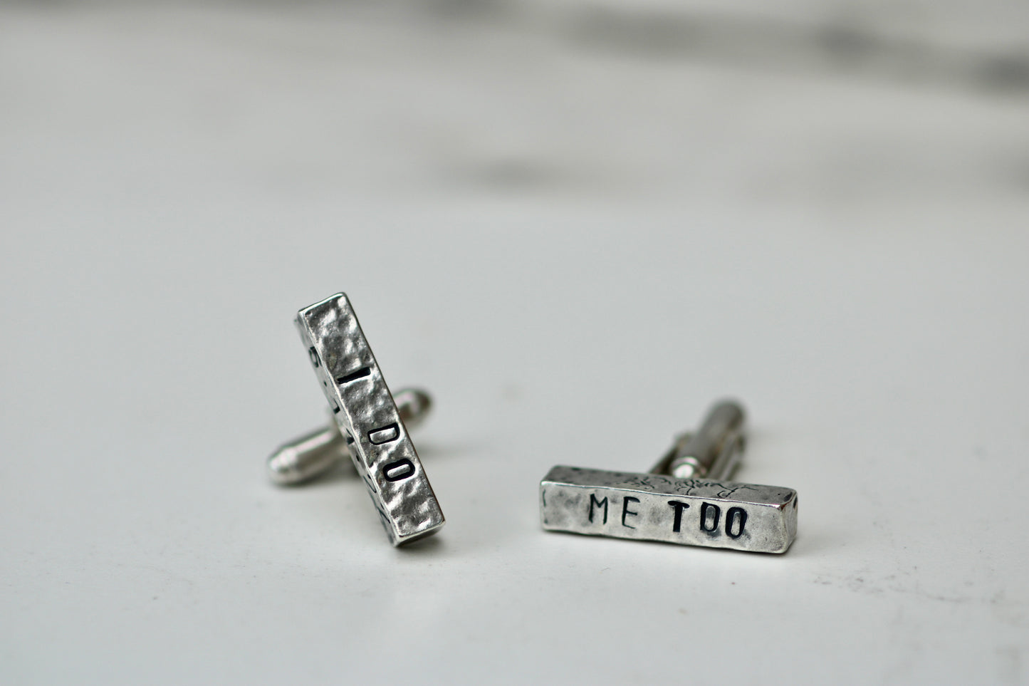 Handcrafted eco silver cufflinks with engraved messages 'I DO' and 'ME TOO' for weddings or special occasions.