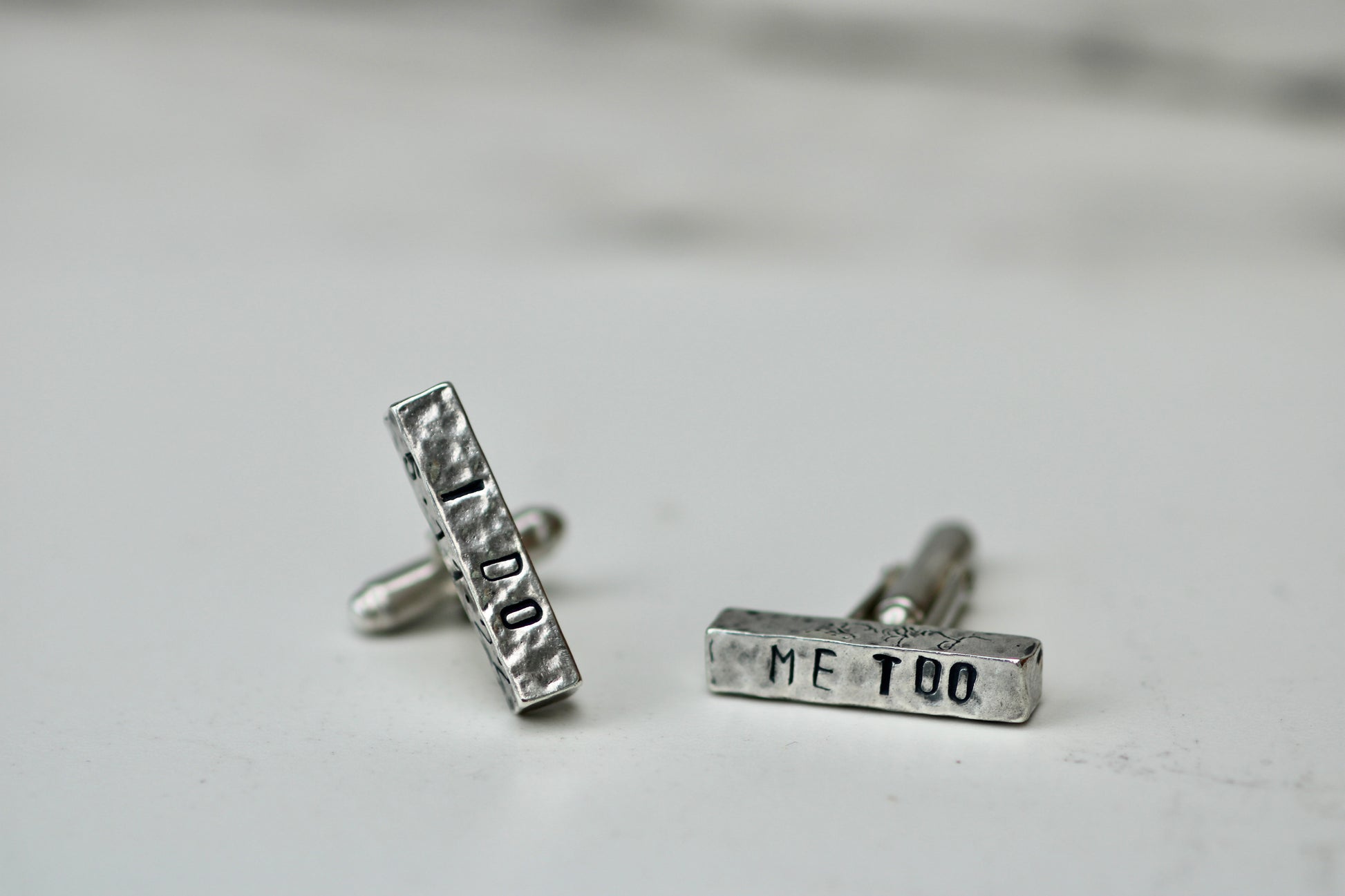 Handcrafted eco silver cufflinks with engraved messages 'I DO' and 'ME TOO' for weddings or special occasions.