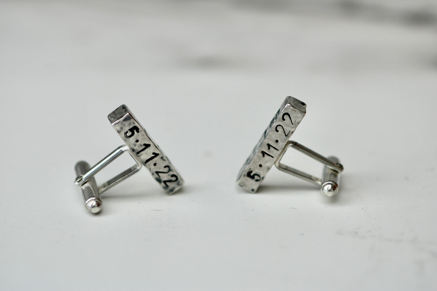 Handcrafted eco silver cufflinks engraved with wedding date, perfect for personalized gifts.