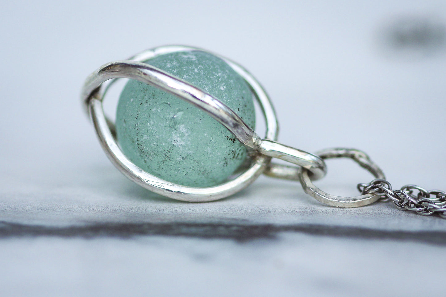 Turquoise blue Codd bottle marble pendant, smoothed by the sea and set in silver