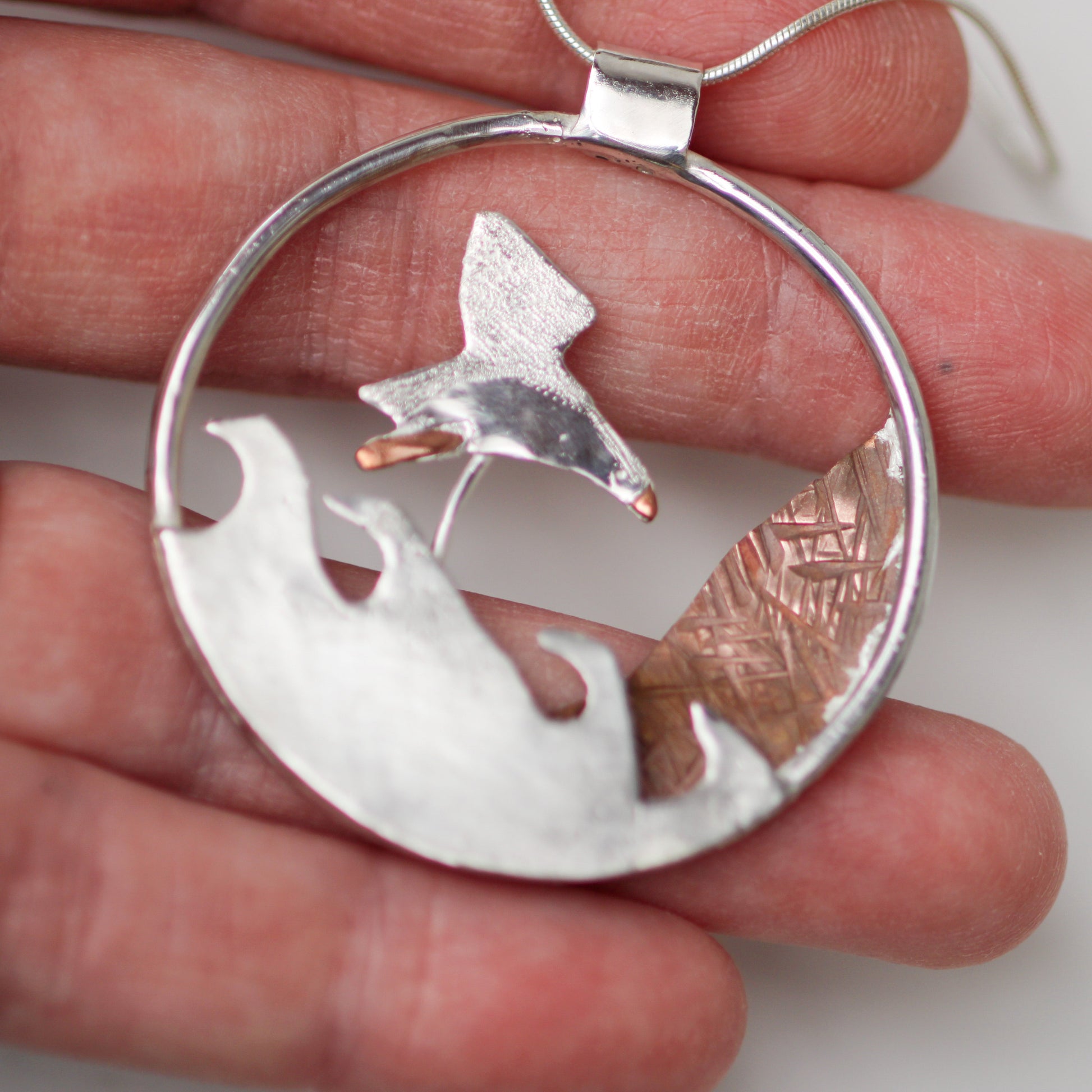 Kinetic puffin necklace - moving jewellery Louella Jewellery