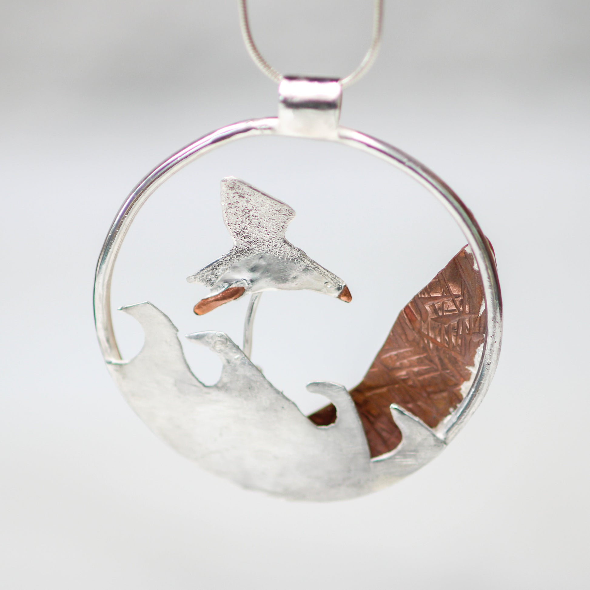 Kinetic puffin necklace - moving jewellery Louella Jewellery