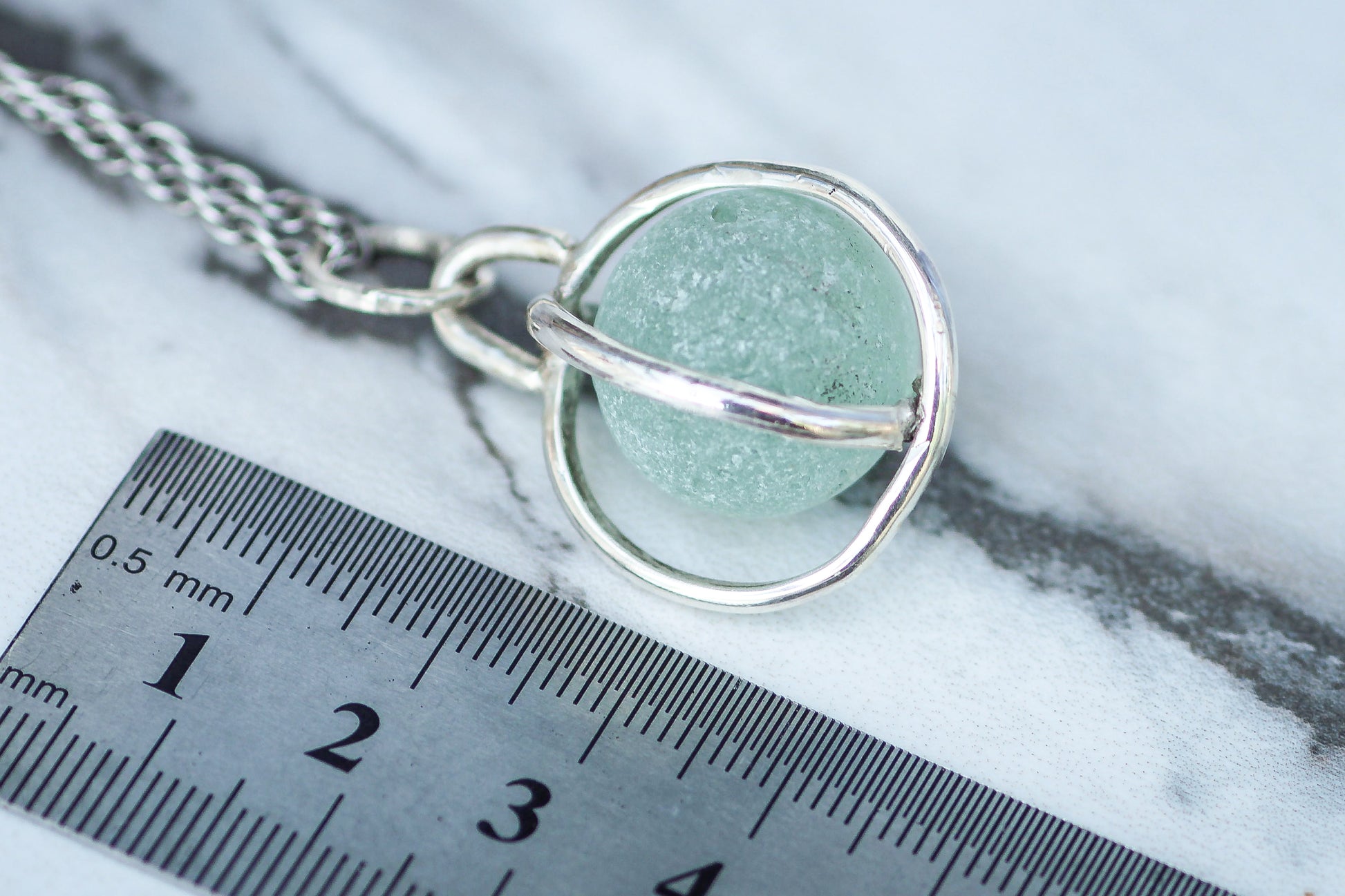 One-of-a-kind aqua blue Codd marble pendant on a sterling silver chain