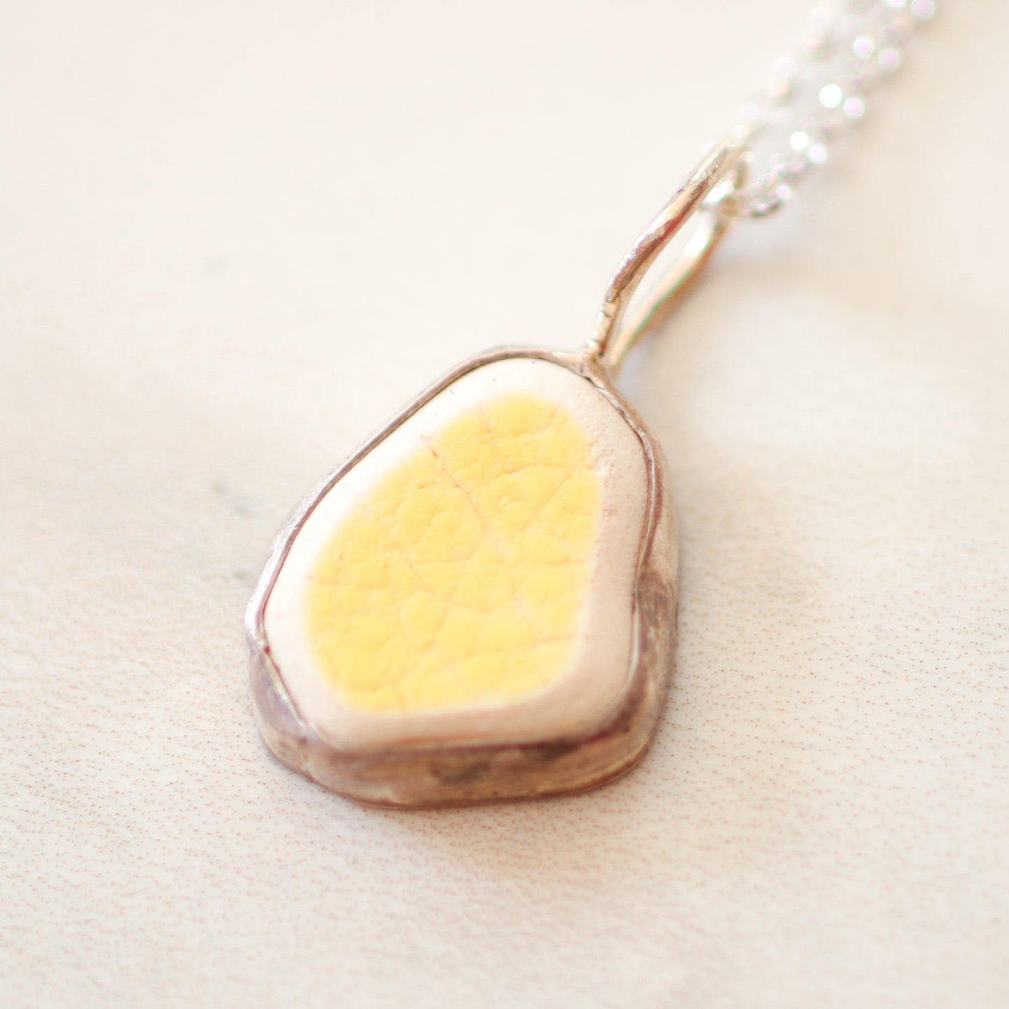 Sun-Warmed Yellow Sea Pottery Pendant from Plymouth