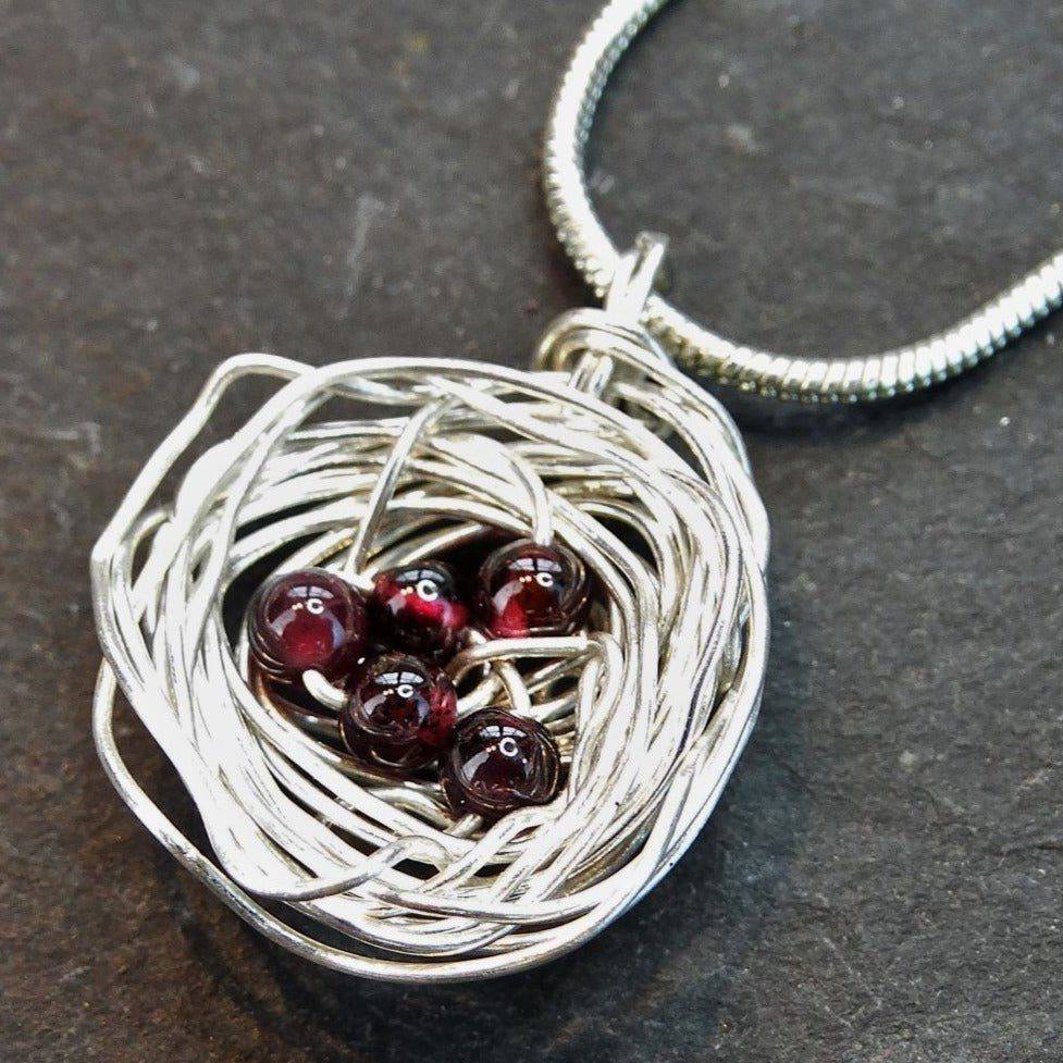 Birds nest pendant, necklace with red gemstone eggs | Necklace | Louella Jewellery