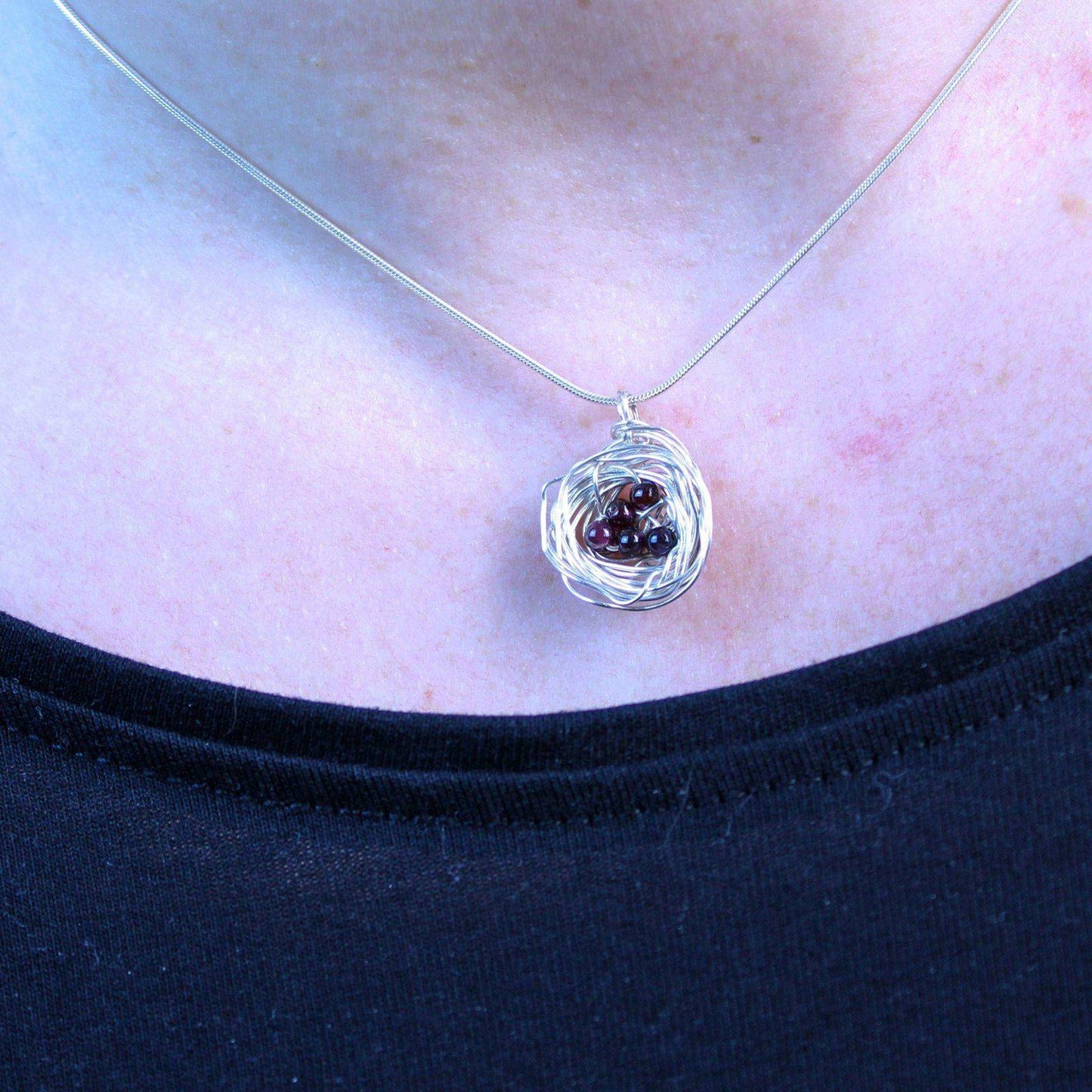 Birds nest pendant, necklace with red gemstone eggs | Necklace | Louella Jewellery