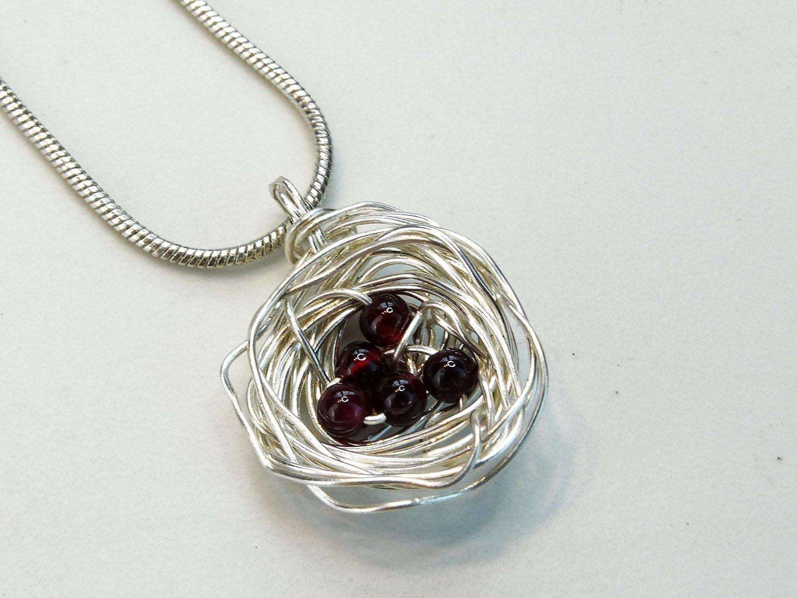 Birds nest pendant, necklace with red gemstone eggs | Necklace | Louella Jewellery