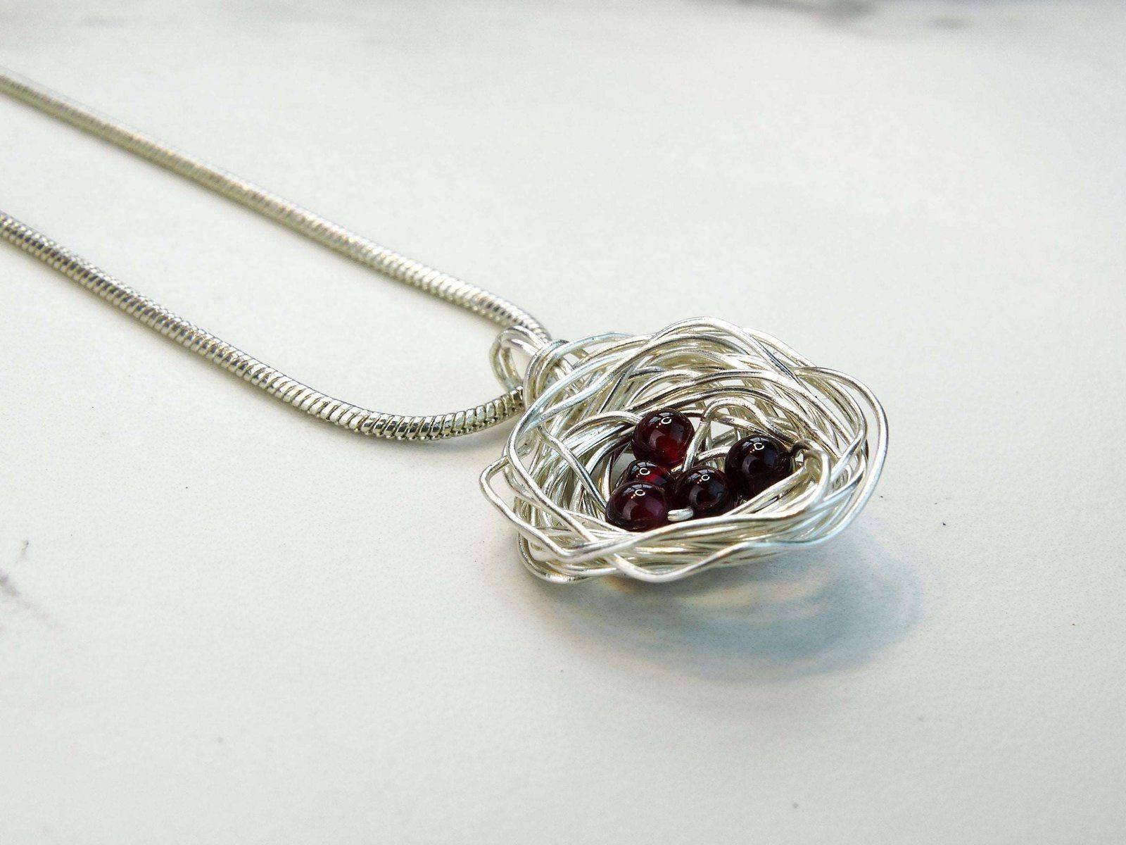 Birds nest pendant, necklace with red gemstone eggs | Necklace | Louella Jewellery