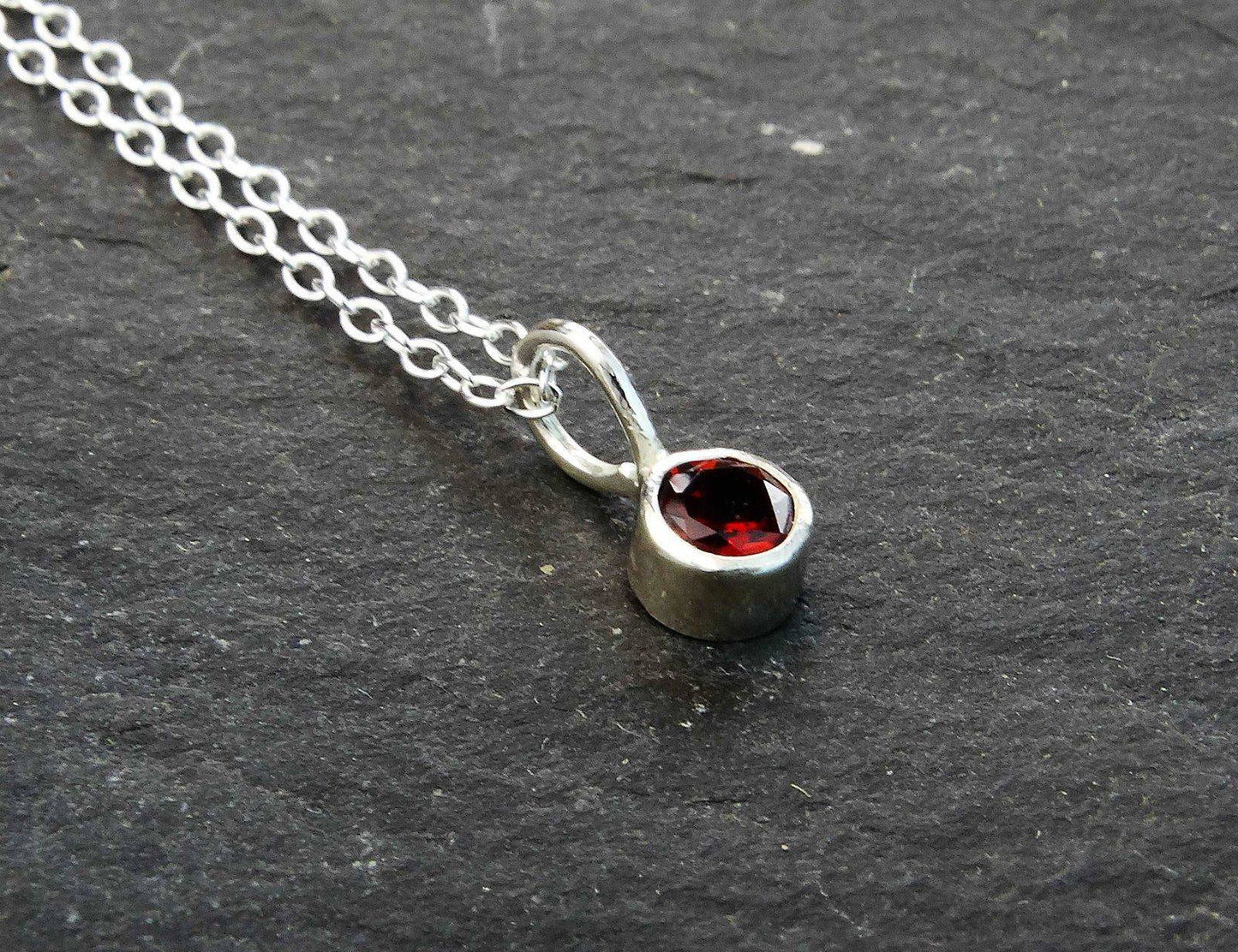 Garnet stud earrings - January birthstone | Earrings | Louella Jewellery