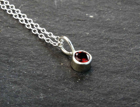 Garnet stud earrings - January birthstone | Earrings | Louella Jewellery