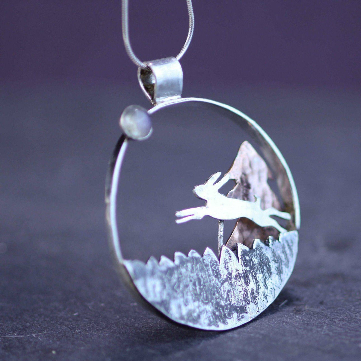 Kinetic running hare necklace - moving jewellery | Louella Jewellery