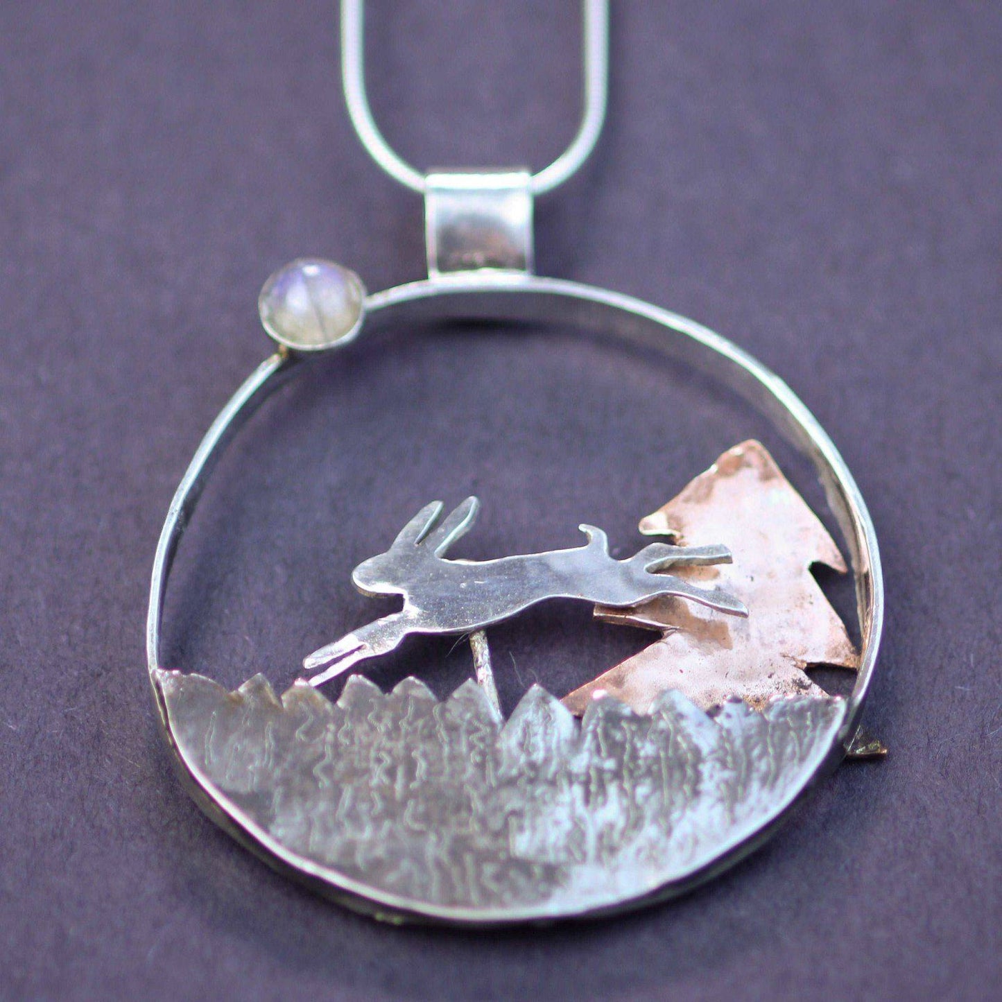 Kinetic running hare necklace - moving jewellery | Louella Jewellery