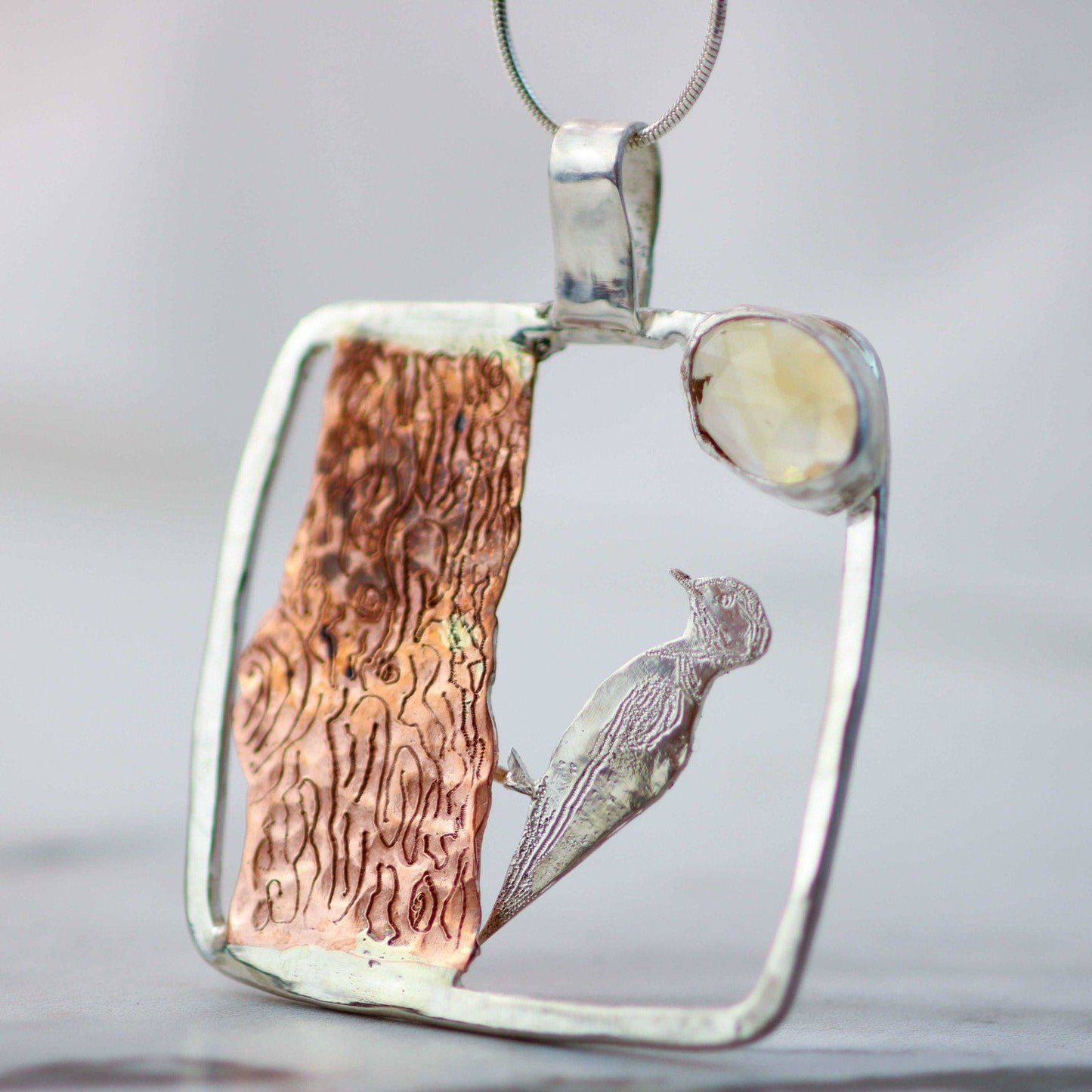 Kinetic woodpecker necklace - moving jewellery | Louella Jewellery