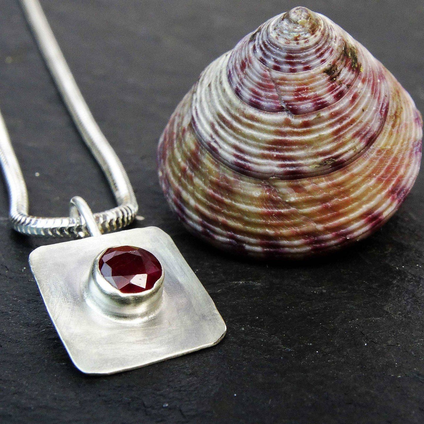 Ruby pendant in brushed silver | Necklace | Louella Jewellery