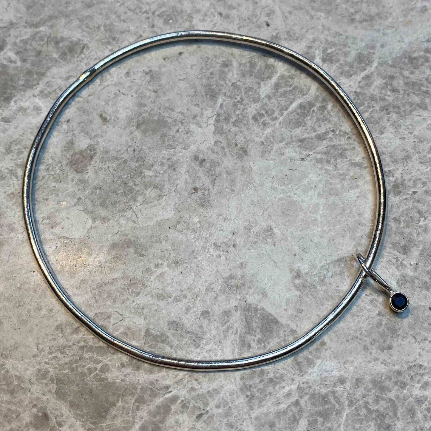 Sapphire bangle - September birthstone | Louella Jewellery