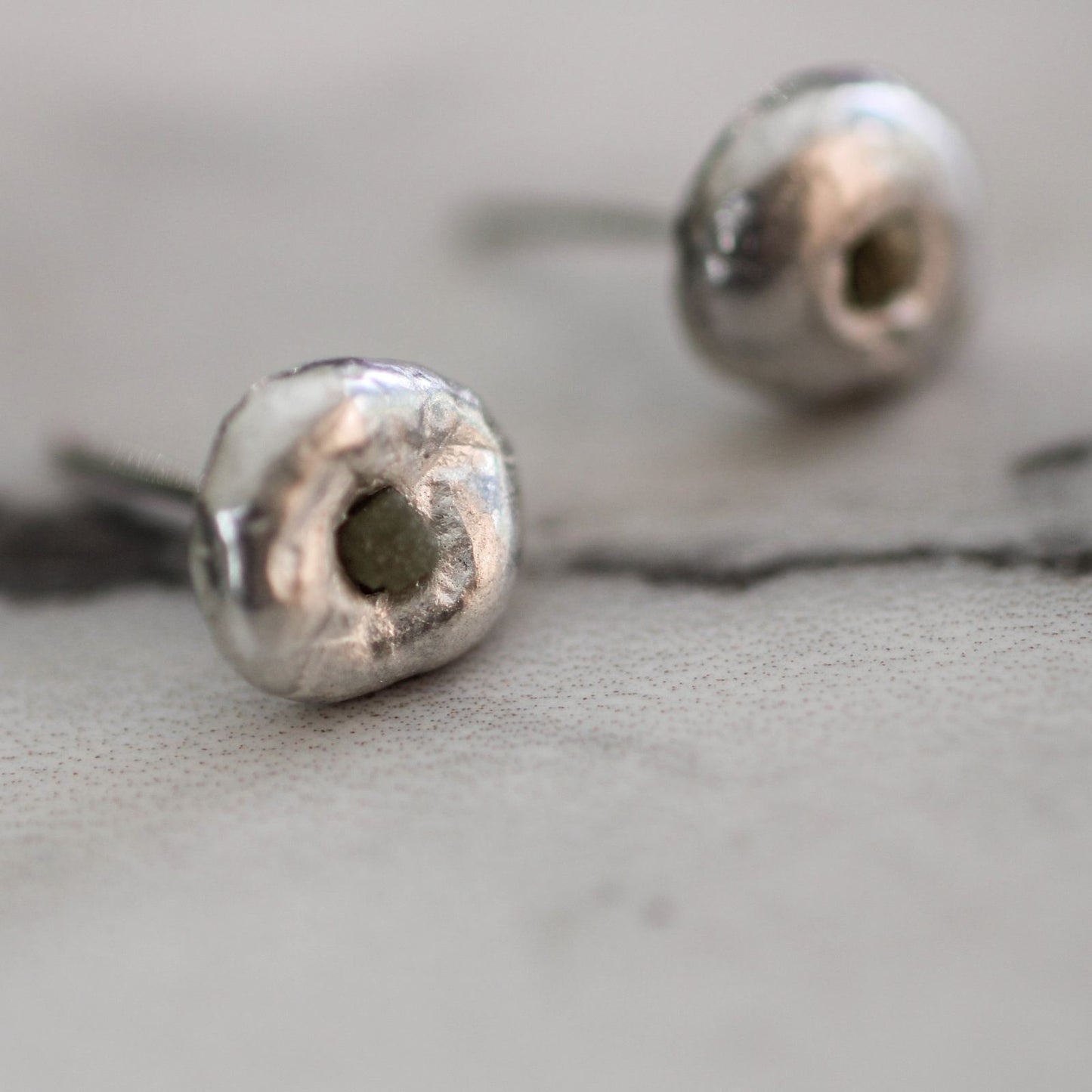 Molten silver stud earrings with raw diamonds louella-jewellery