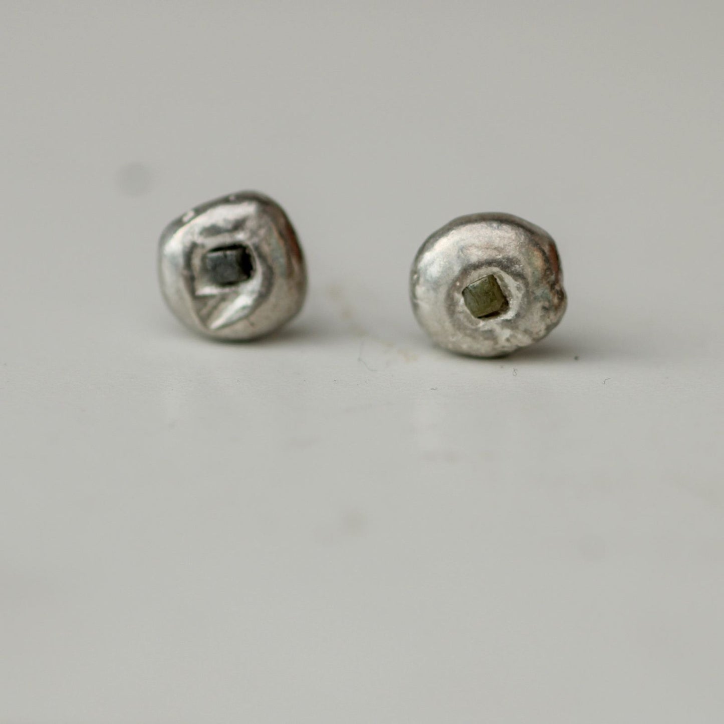Molten silver stud earrings with raw diamonds louella-jewellery